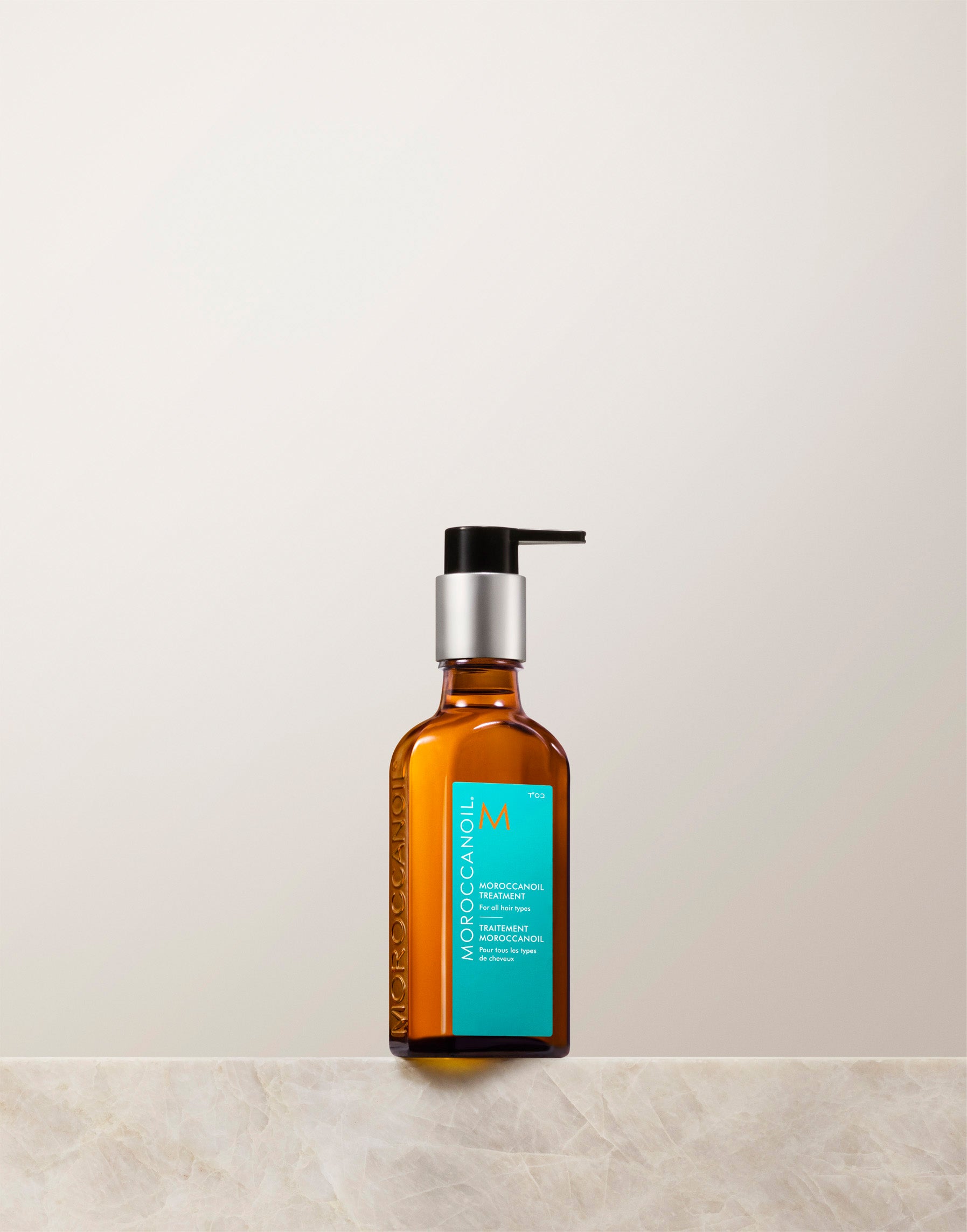 Hair oil bottles on shelf